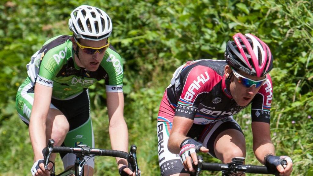 Conor Dunne of An Post Chain Reaction (left) failed to cross into to top group in the first stage of An Post Rás. Photograph: Ciaran Fallon/Inpho.