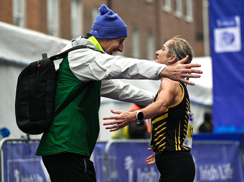 Irish women's national champion Ann-Marie McGlynn celebrates with race director Jim Aughney after the 2023 Irish Life Dublin Marathon. Thousands of runners took to the Fitzwilliam Square start line, to participate in the 42nd running of the Dublin Marathon. Photograph: Sam Barnes/Sportsfile