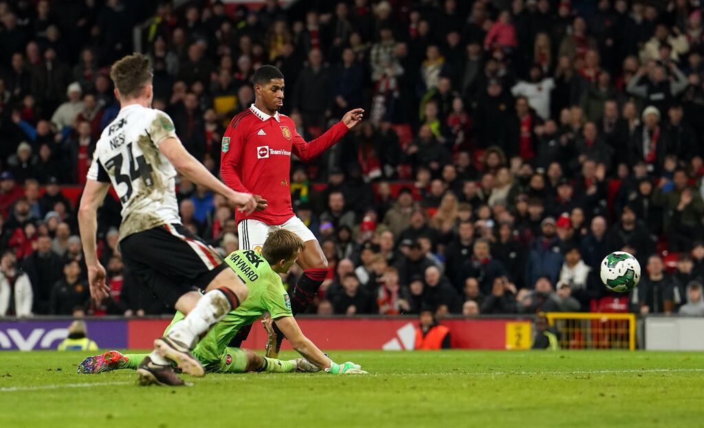 Manchester United's Marcus Rashford scores against Charlton. Photograph: Martin Rickett/PA Wire