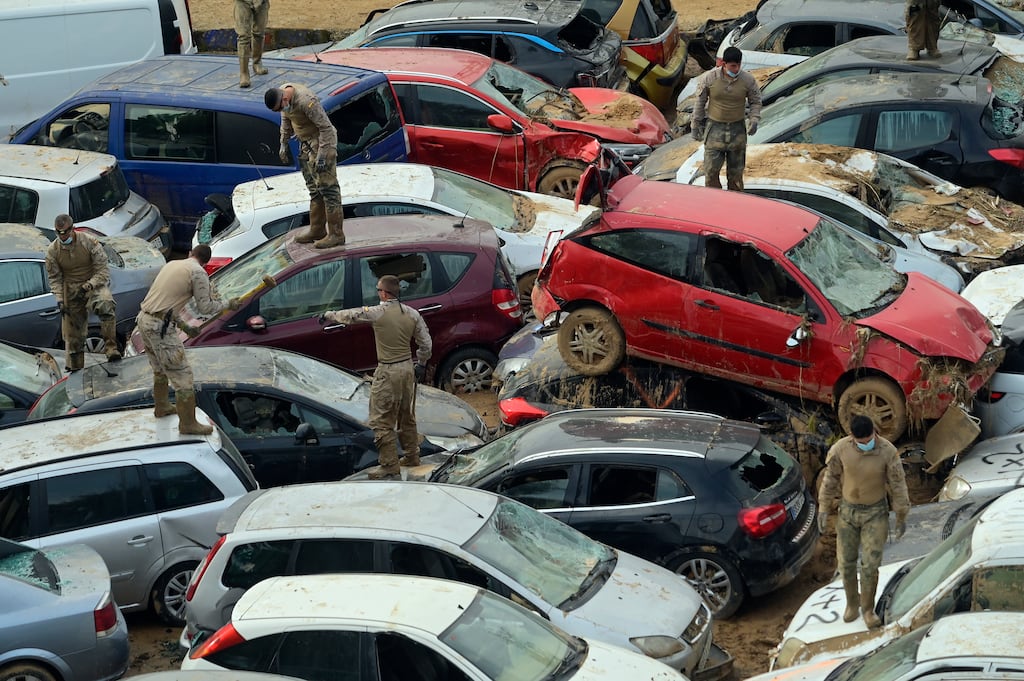 Soldiers search wrecked cars damaged by flooding in Massassana, Valencia, eastern Spain, on November 8th. Photograph: Jose Jordan/AFP via Getty Images