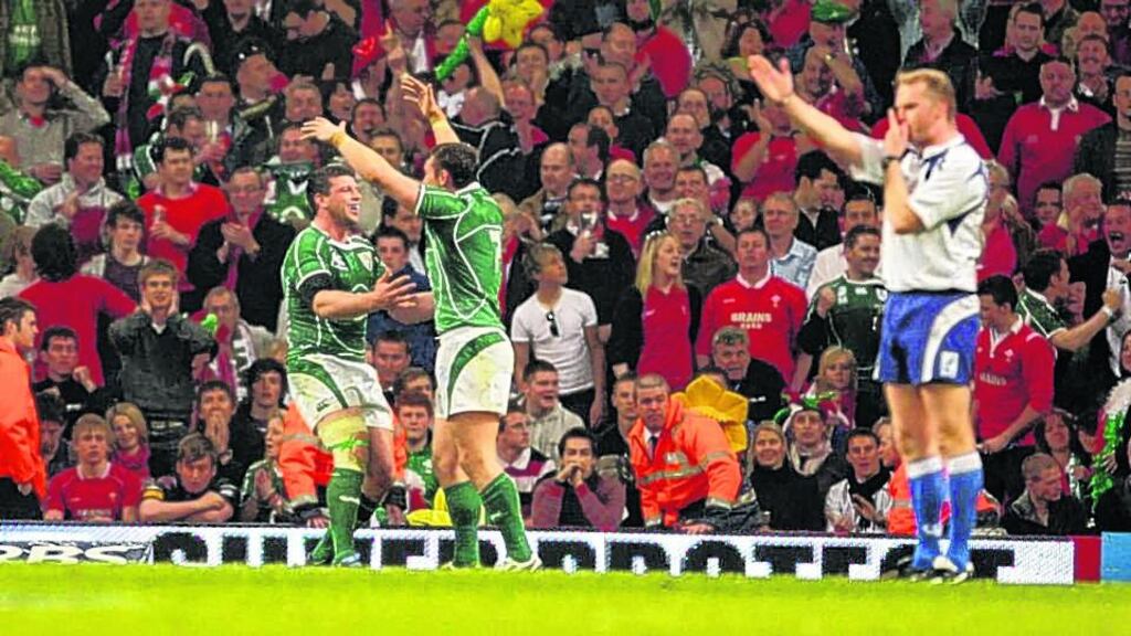 Wayne Barnes blows for full-time on Ireland’s Grand Slam victory in Cardiff. Photograph: Alan Betson