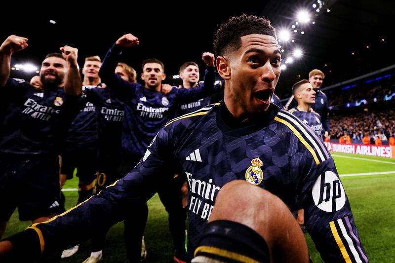 Jude Bellingham of Real Madrid celebrates following victory in the penalty shoot-out during the UEFA Champions League quarter-final second-leg match between Manchester City and Real Madrid CF. Photograph: Naomi Baker/Getty Images