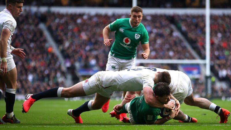 Robbie Henshaw scores Ireland’s first try during defeat to England at Twickenham. Photograph: Warren Little/Getty Images