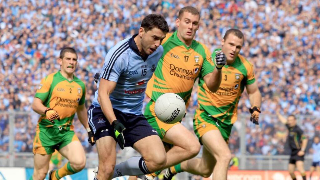 Dublin’s Bernard Brogan followed by Paddy McGrath, Eamonn McGee and Neil McGee of Donegal in the 2011 All-Ireland semi-final. Photograph: James Crombie/Inpho