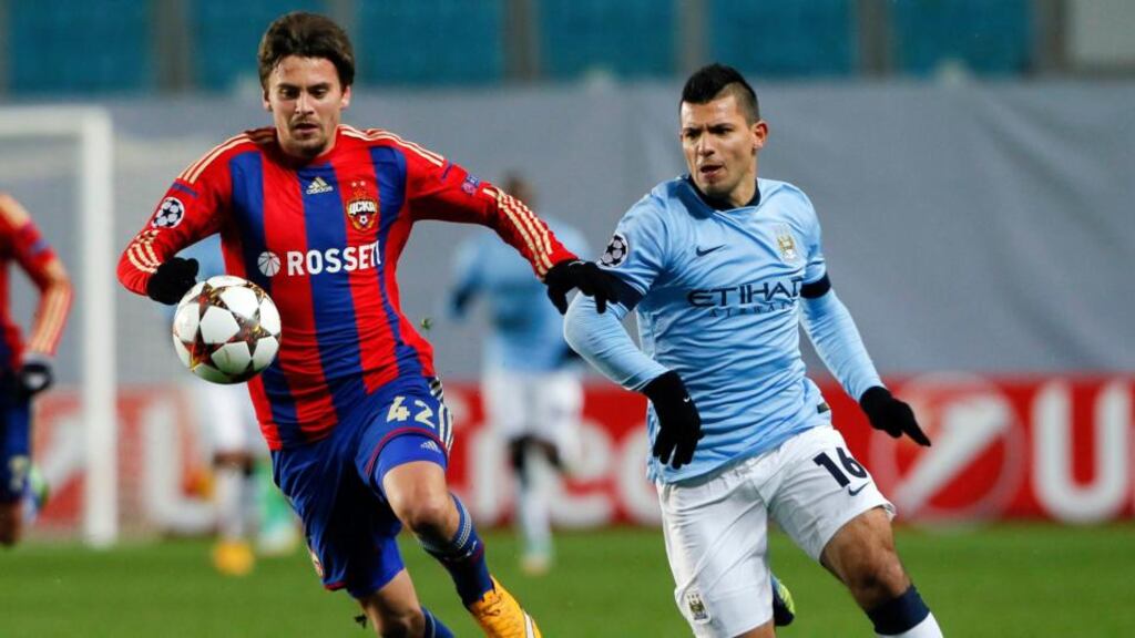 CSKA Moscow’s Georgi Schennikov (left) is tracked by Manchester City’s Sergio Aguero during their Champions League Group E match at the Arena Khimki. Photograph: Maxim Shemetov / Reuters