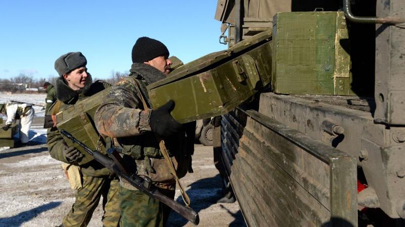 Pro-Russian rebels load ammunition onto a truck near the eastern Ukrainian city of Debaltseve on Tuesday. Photograph: Vasily Maximovvasily/AFP/Getty Images.