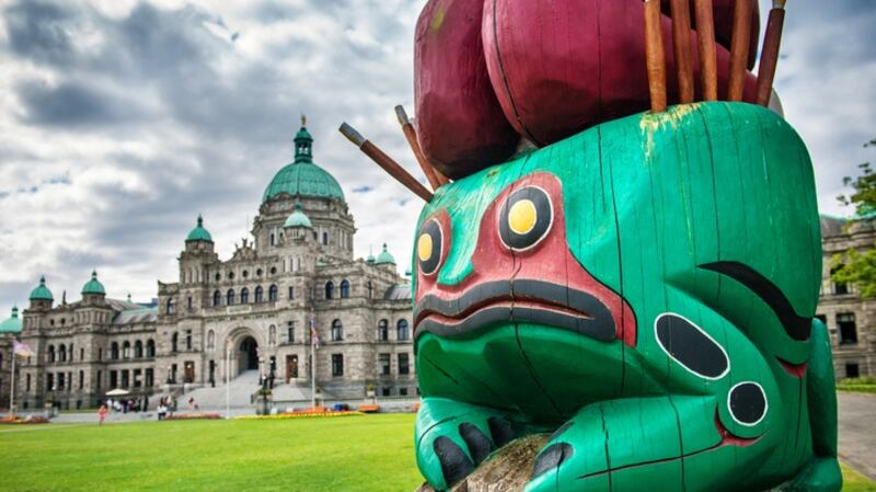 The Knowledge Totem is an Indian totem, carved by the Cowichen tribes, in front of the British Columbia Parliament building. Photograph: Getty Images