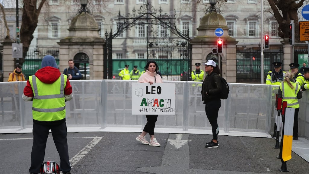Protesters outside Leinster House in Dublin as the Dáil resumes after the Christmas break. Photograph: Niall Carson/PA Wire
