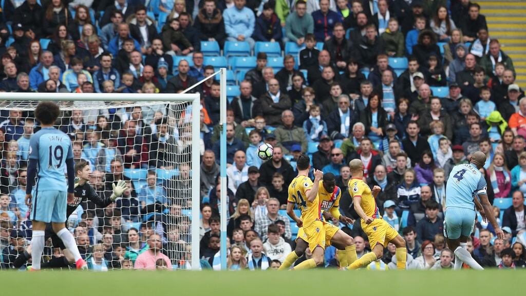 Vincent Kompany scores Manchester City’s second goal during their 5-0 win over Crystal Palace. Photograph: Mark Robinson/Getty