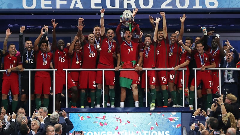 Cristiano Ronaldo lifts the Henri Delaunay trophy after Portugal’s 2016 European Championshsip win. Photograph: Valery Hache/Getty/AFP