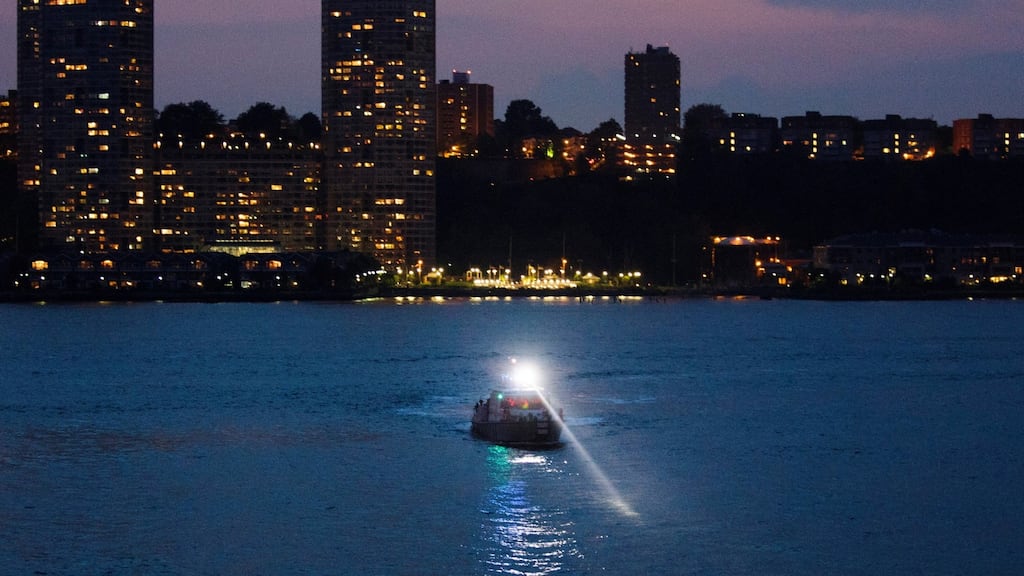 A police boat is seen on the scene of a plane crash in the Hudson River in New York. Photograph: Justin Lane/EPA