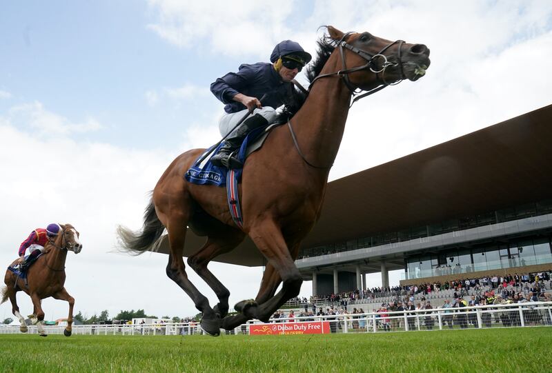City Of Troy ridden by jockey Ryan Moore winning the Barronstown Stud Irish European Breeders Fund Maiden at the Curragh. Photograph: Brian Lawless/PA
