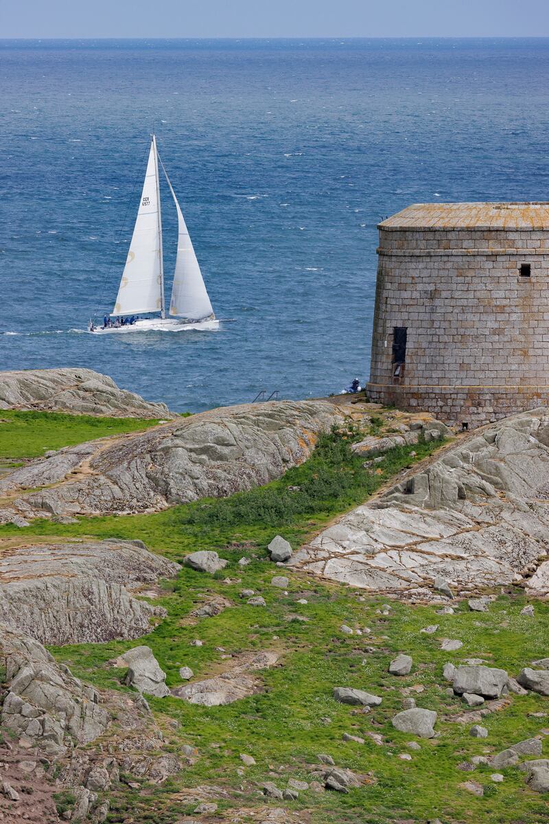 Frank Whelan's Greystones entry Opal passing Dalkey Island at the start of the Volvo Dun Laoghaire to Dingle Race. Photograph: David Branigan/Oceansport