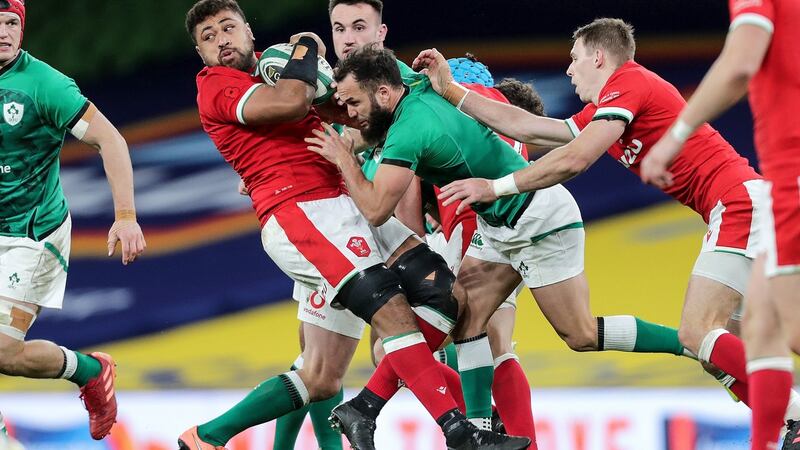 Jamison Gibson-Park tackles Taulupe Faletau during Ireland’s win in Dublin. Photograph: Laszlo Geczo/Inpho