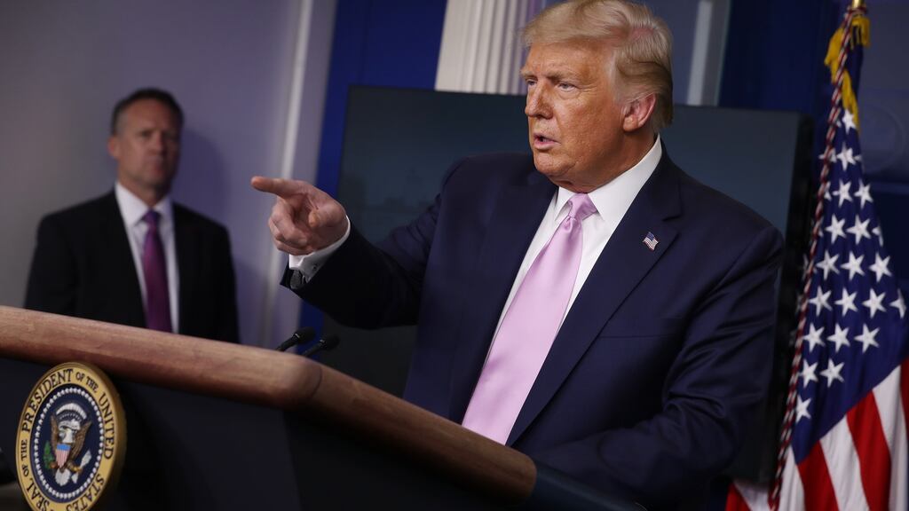President Donald Trump signed an executive action to provide $300 a week in federal support to most unemployment benefit recipients. Photograph: Chip Somodevilla/Getty Images