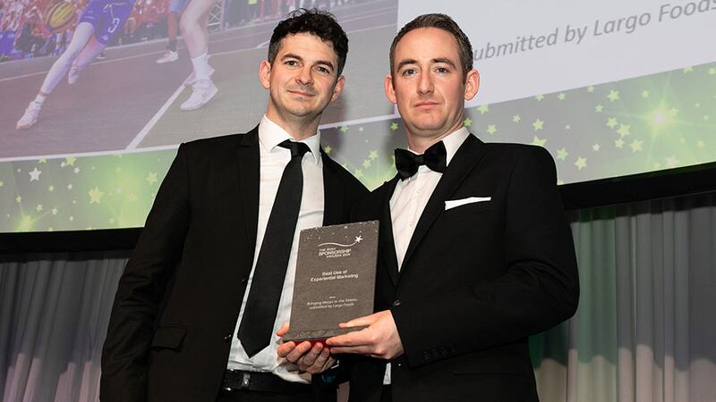 Conor Cullen, Sponsorship and Events Manager, Football Association of Ireland presents the Best Use of Experiential Marketing award to Ian O' Rourke, Largo Foods.