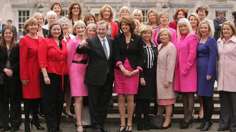 TDs and Senators with Taoiseach Enda Kenny on the plinth at Leinster House to celebrate International Women’s Day 2012. A new report says there are far too few women in politics. Photograph: Alan Betson/The Irish Times