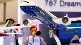 Boeing profit tops estimates