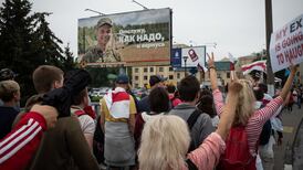 Tensions high in Belarus as troops gather at protester meeting site