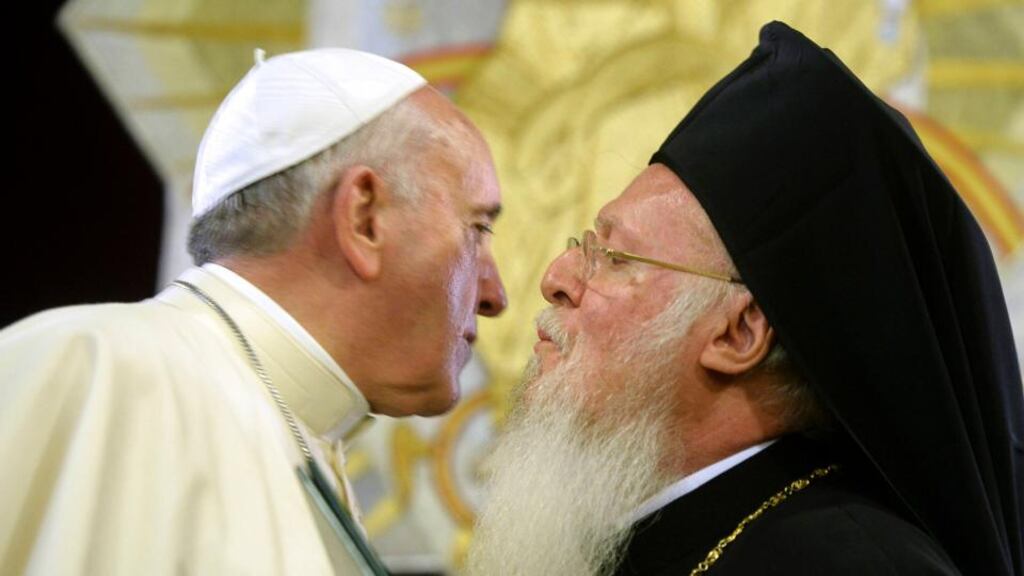 Pope Francis kisses Ecumenical Patriarch Bartholomew I after they signed a joint statement at St George church, the principal Greek Orthodox cathedral, in Istanbul on November 30th, 2014. Photograph: Filippo Monteforte/Reuters