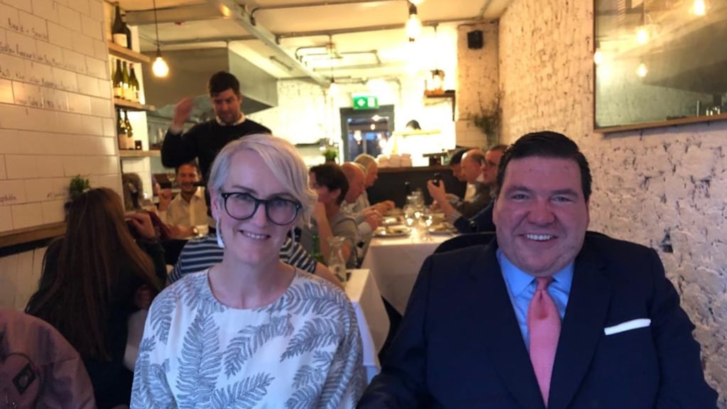 Jonathan O’Grady with restaurant critic Catherine Cleary. His muscular atrophy is progressing gradually as his muscles lose their strength. ‘I used to be able to lift a pint of Guinness. Now I have to drink it through a straw,’ he says.