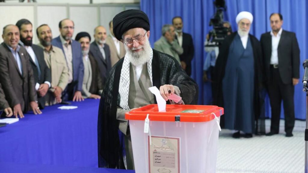 Iran’s supreme leader Ayatollah Ali Khamenei casts his ballot at his office during the Iranian presidential election in central Tehran today. Photograph: Fars News/Hassan Mousavi/Reuters