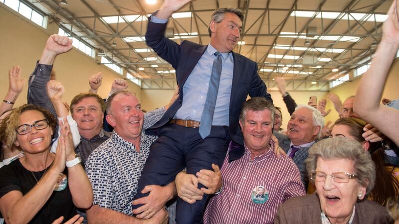 Billy Kelleher (FF) is held aloft by supporters at Nemo Rangers GAA Club in Co Cork after being elected an MEP in Ireland South. Photograph: Michael Mac Sweeney/Provision