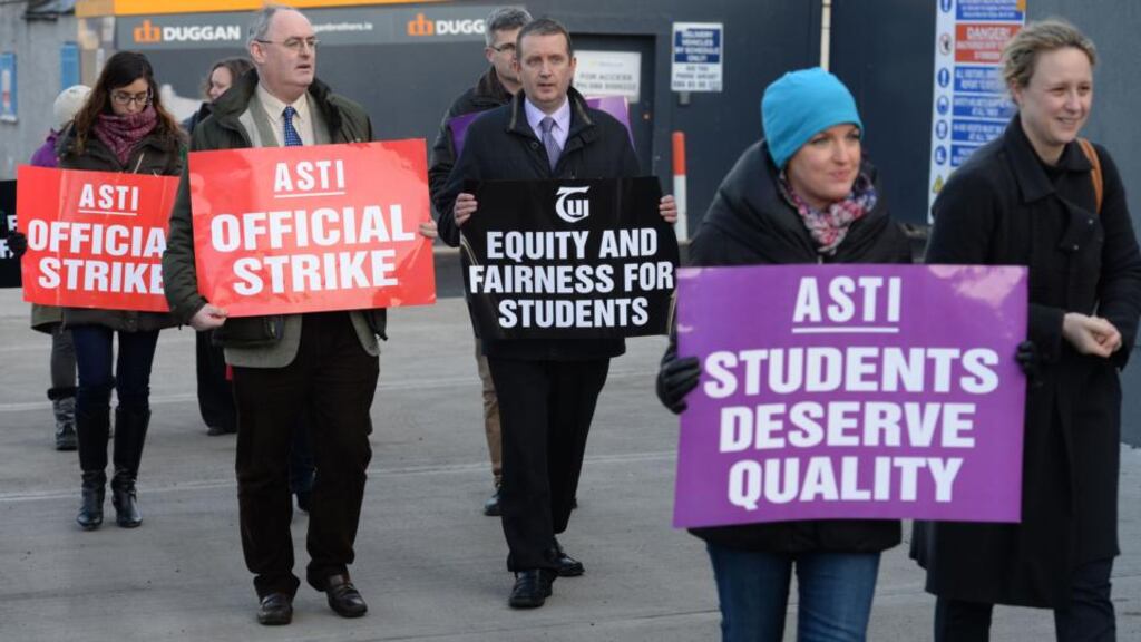 Gerry Quinn, TUI president and Philip Irwin, ASTI president with secondary school teachers at Newpark Comprehensive. Newtownpark Ave, Blackrock, Co. Dublin, at a picket  over planned junior cycle reforms earlier this year. Photograph: Dara Mac Dónaill / The Irish Times