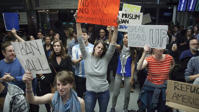 People protest at the arrivals hall of San Francisco’s SFO International Airport after people arriving from Muslim-majority countries were held at the border control as a result of the new executive order by US president Donald Trump. Photograph: EPA