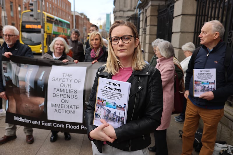 Caroline Leahy and members of the Midleton and East Cork Flood Protection Group outside Leinster House in February 2024. Photograph: Dara Mac Dónaill/The Irish Times