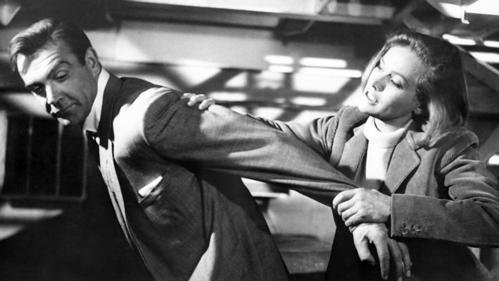 Sean Connery and Honor Blackman filming a scene for Goldfinger at Pinewood Studios in Buckinghamshire in 1964. Photograph: PA/PA Wire