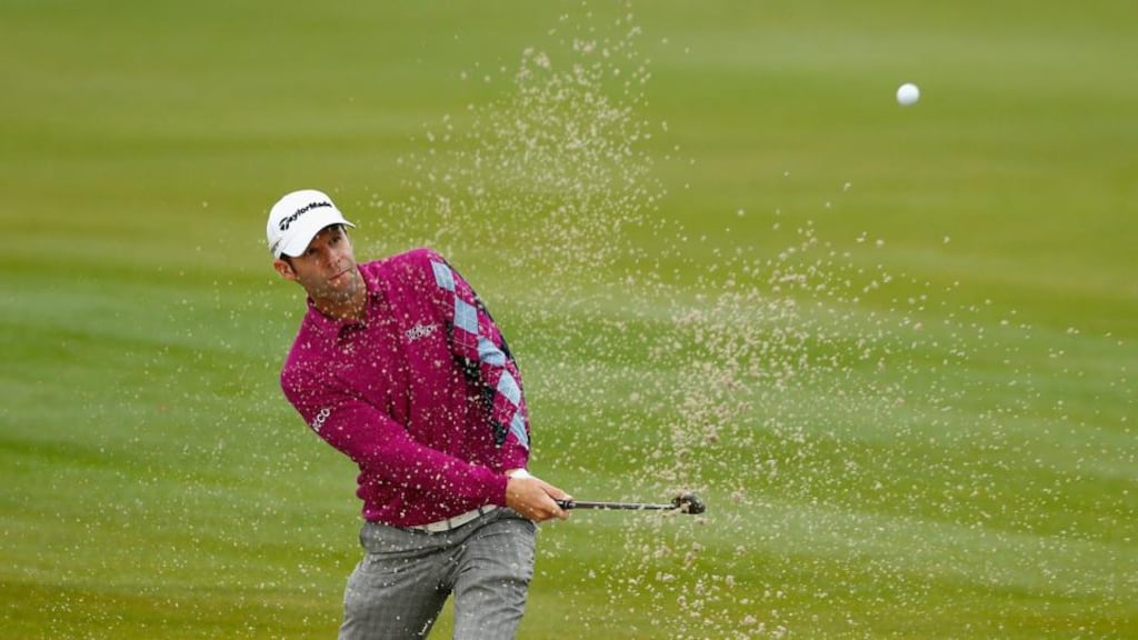 Bradley Dredge of Wales chips out of a bunker on the 18th hole on day two of the M2M Russian Open at Skolkovo Golf Club  in Moscow. Photograph: Harry Engels/Getty Images