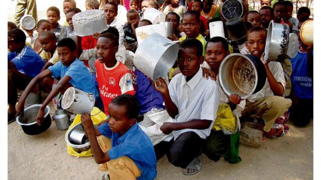 Internally displaced Somali children wait in recent days to receive food aid at a distribution centre in Mogadishu, Somalia. Photograph: Mohamed Sheikh Nor/AP Photo