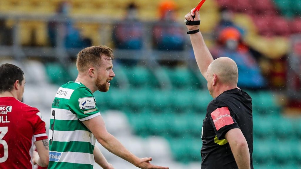 Shamrock Rovers’ Sean Hoare is shown a red card by referee Graham Kelly during his team’s draw with Derry. Photograph: Brian Reilly-Troy/Inpho