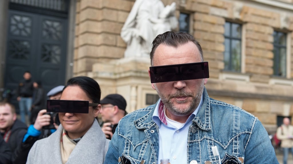 Lutz Bachmann (right), co-founder of Patriotic Europeans Against the Islamisation of the West (Pegida), wearing an angular pair of sunglasses as his trial began at the district court in Dresden, Germany. Photograph: Sebastian Kahnert/EPA