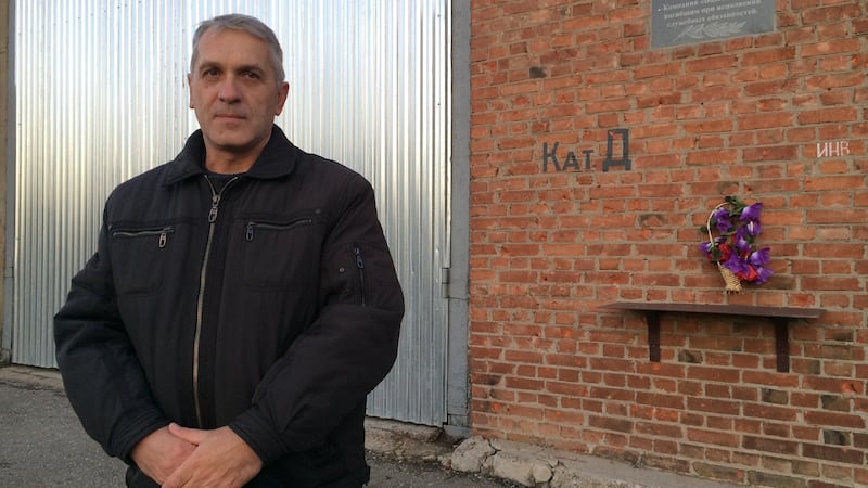 Sergei Suprun, head of the Semenivka section of the Siverskyi Donets-Donbas water canal, which supplies millions of people on both sides of eastern Ukraine’s front line. He is standing before a memorial to two colleagues killed by shelling at the pumping station in June 2014. Photograph: Daniel McLaughlin