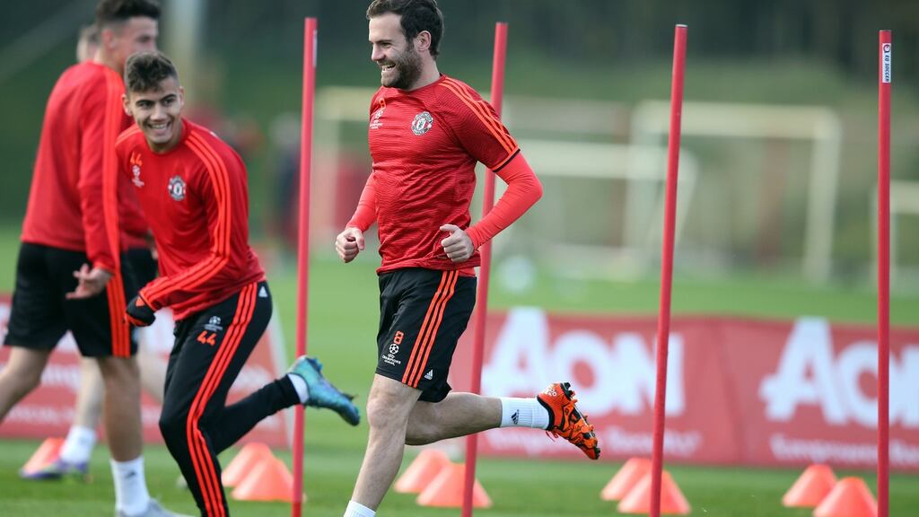 Manchester United’s Juan Mata and Andreas Pereira during a training session at Carrington Training Ground. Photograph: Peter Byrne/PA