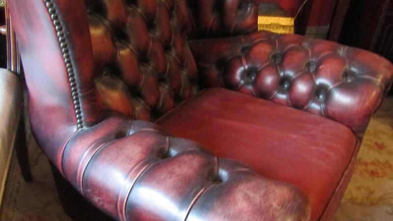 Lot 825: Chesterfield armchair previously owned by Pat the Baker (€70-€120) at Matthews Auction Rooms.