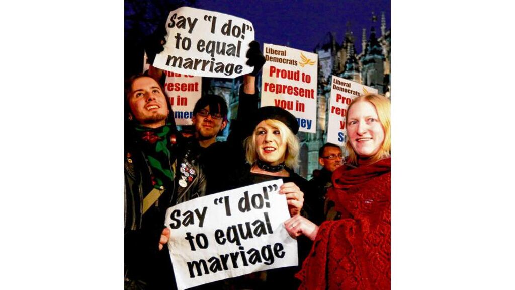 Campaigners demonstrate for a Yes vote to allow gay marriage outside Westminster in London yesterday. Photograph: Luke MacGregor/Reuters