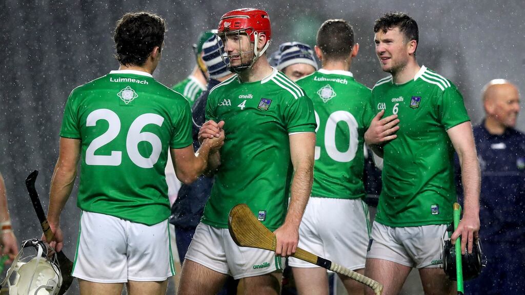 Limerick’s Pat Ryan and Barry Nash celebrate after the Munster semi-final victory over Tipperary at Páirc Uí Chaoimh. Photograph: Ryan Byrne/Inpho
