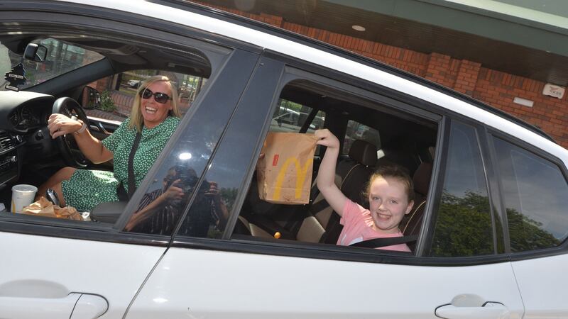 Edel Farrell and her daughter Layla (10) were among those to visit the  McDonalds on the Kylemore Road. Photograph: Alan Betson/The Irish Times