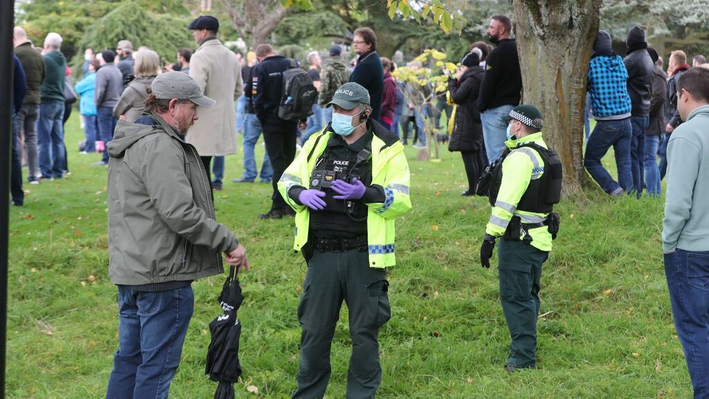 A police officer talking to an anti-lockdown protester on the Stormont estate in Belfast at the weekend. Photograph: Niall Carson/PA