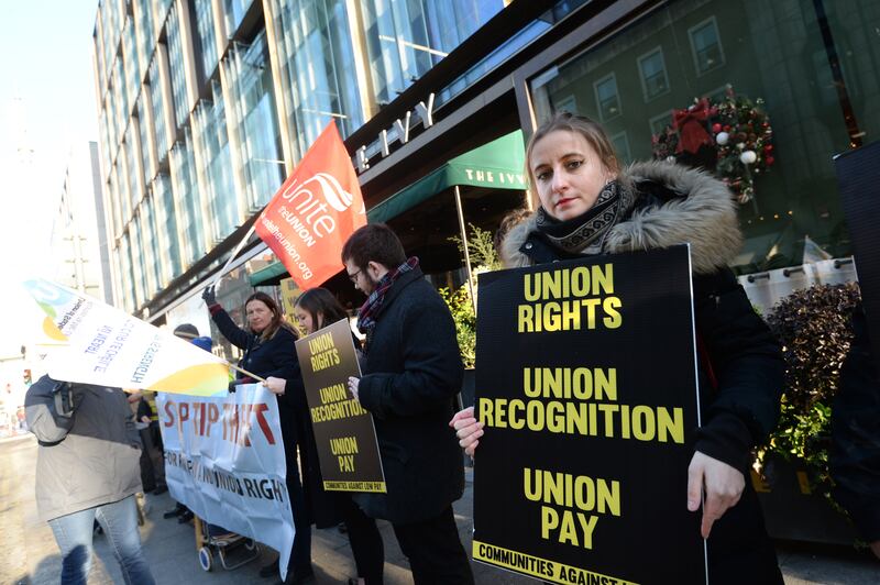Julia Marciniak, right, a former worker at The Ivy joined the protest outside the restaurant on Dawson Street in Dublin. Photograph: Dara Mac Dónaill