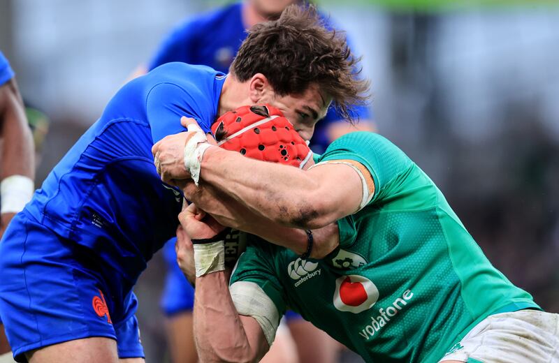 France’s Antoine Dupont and Josh van der Flier of Ireland. Photograph: Dan Sheridan/Inpho