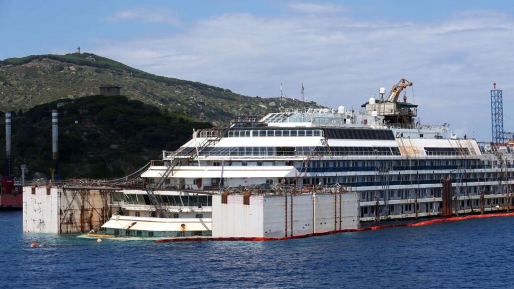 The ‘Costa Concordia’ being prepared to be towed off the coast near the port of Giglio in Italy yesterday. Photograph: EPA/Alessandro di Meo
