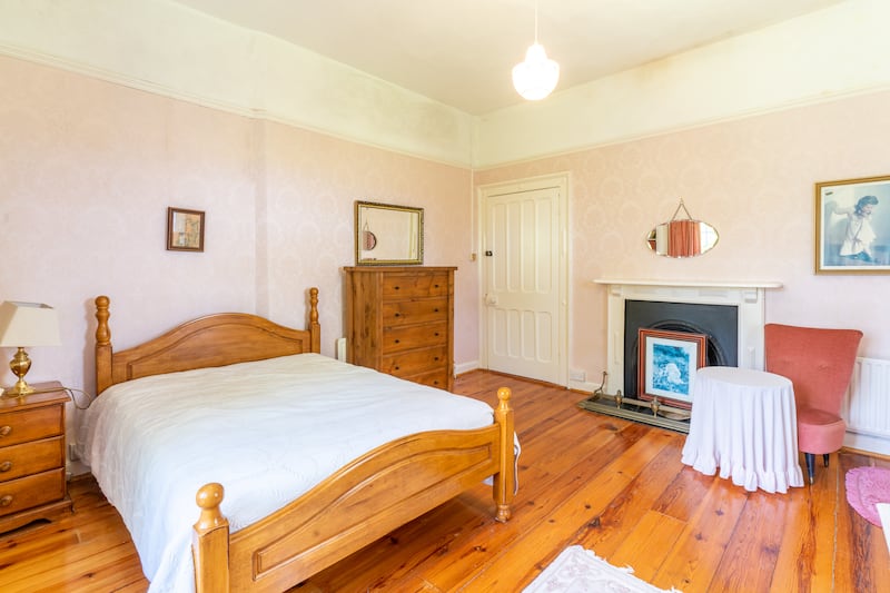 Bedrooms retain period marble fireplaces