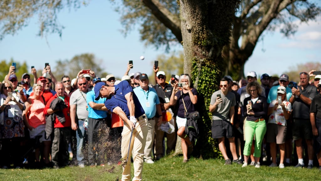 Rory McIlroy plays a recovery shot on the eighth hole during the first round of the Arnold Palmer Invitational at the Bay Hill in Orlando. Photograph: Richard Heathcote/Getty Images
