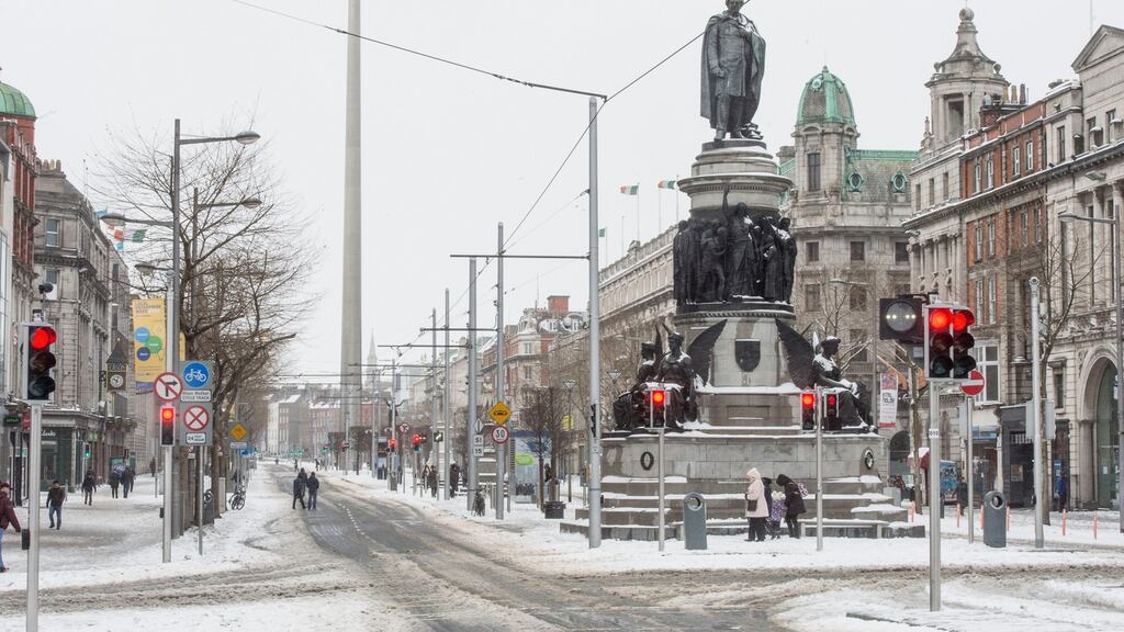 Snow hits Dublin’s O’Connell Street. Photograph: Brenda Fitzsimons/The Irish Times