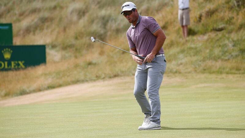 Ryan Fox watches as his putt to win in normal time stays out. Photo: Craig Brough/Reuters