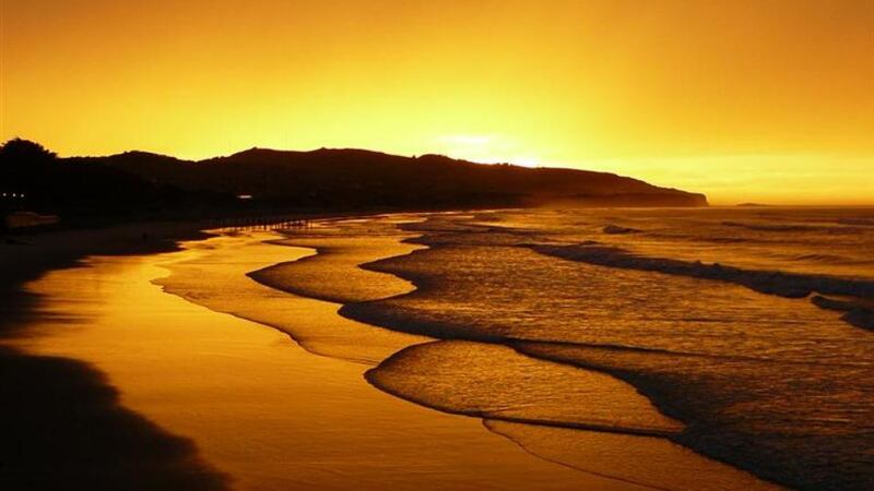 Dunedin Peninsula at sunset. Photograph: Shaun Templeton